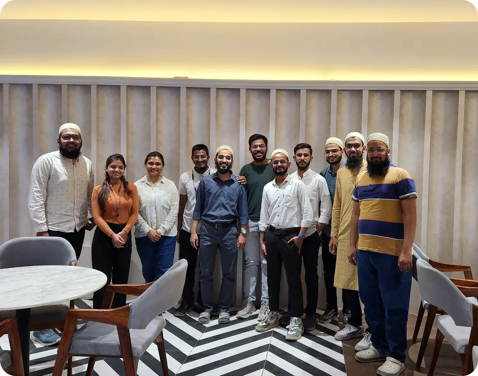 Team gathering and smiling